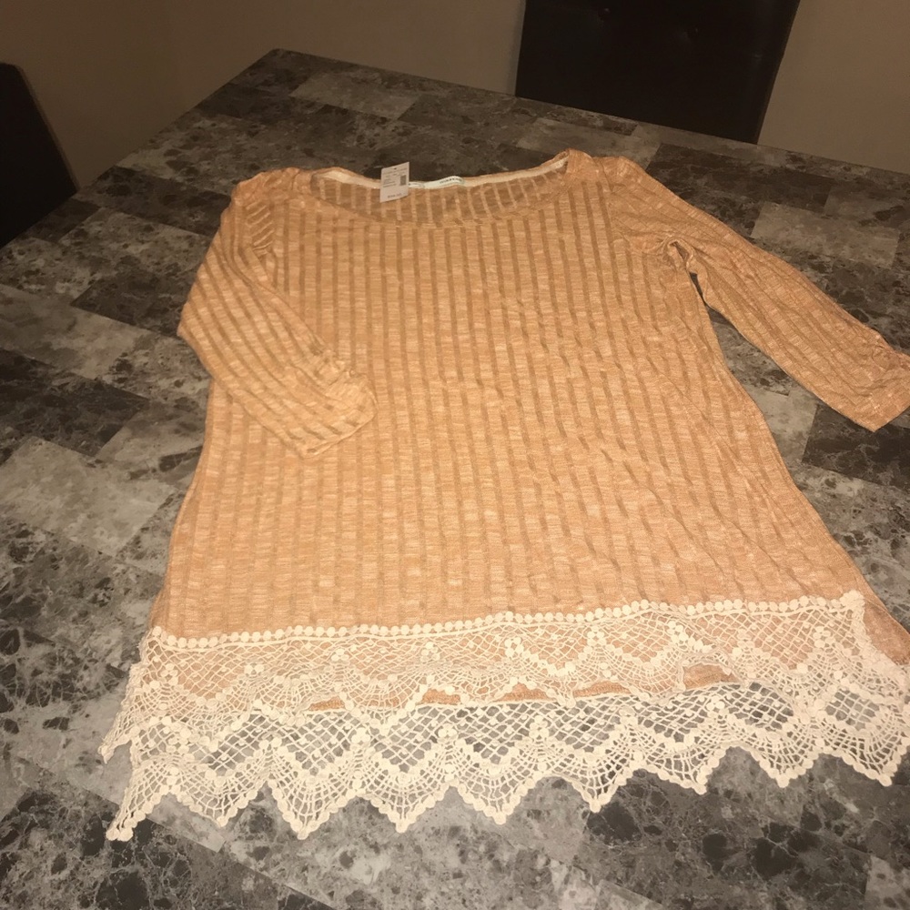 Light orange sweater